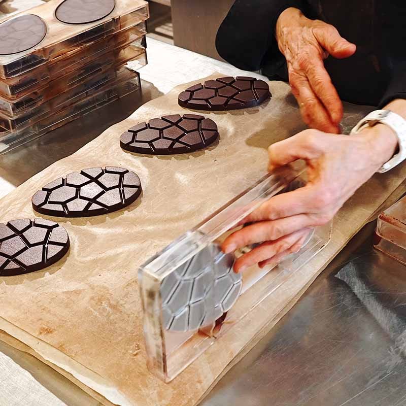 Noir 60% lacté BIO - Le Secret de Pompon, le lapin joueur et de Toupla l'oeuf plat en chocolat