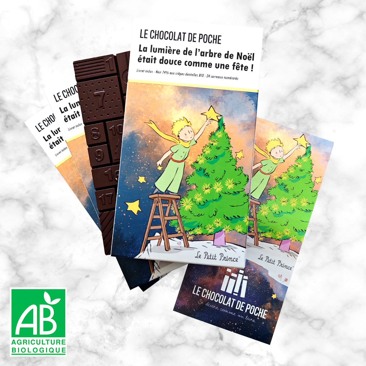 Le Petit Prince - Grande tablette de l'Avent et de Noël - noir 74% crêpes dentelles BIO - La lumière de l'arbre de Noël était douce comme une fête !